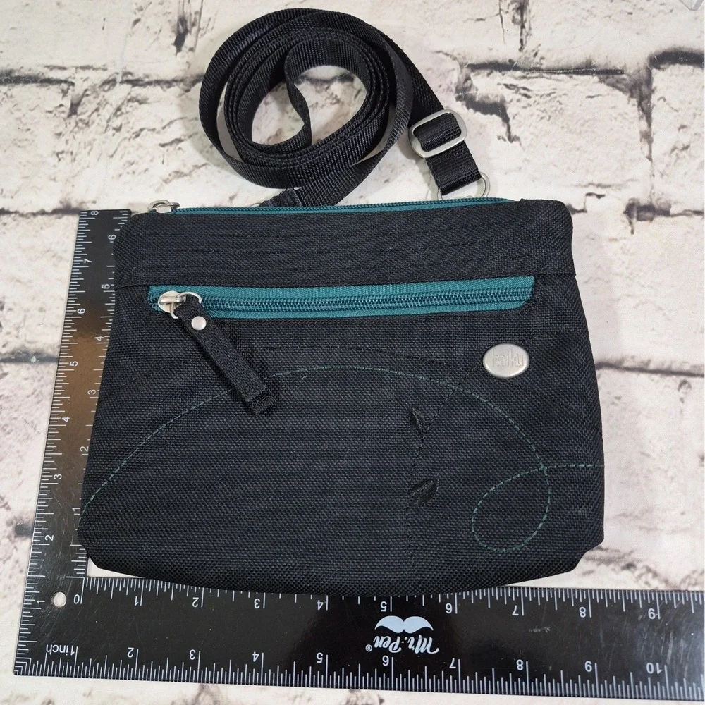 Haiku Impulse Crossbody Bag Black Green Multi-Pocket Travel Purse